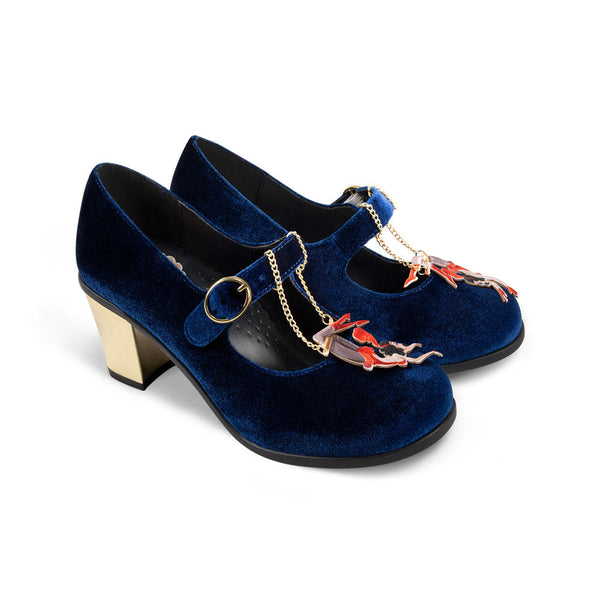 Chocolaticas® Mid Heels Les Dames Du Cirque Women's Mary Jane Pump - Pair of blue velvet shoes with gold chain and floral embellishments on a white background
