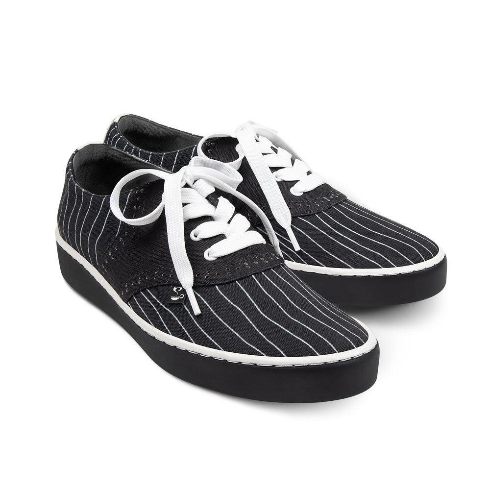 Chocolaticas® Pumpkin King Casual Sneaker by Hot Chocolate Design. Black pinstripe sneakers with white laces on a white background