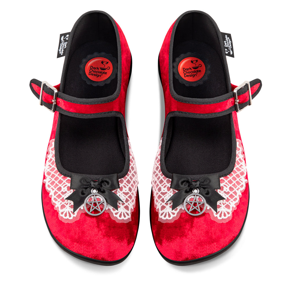 Chocolaticas® Sabrina Women's Mary Jane Flat - Red shoes with black accents and white lace patterns on a white background