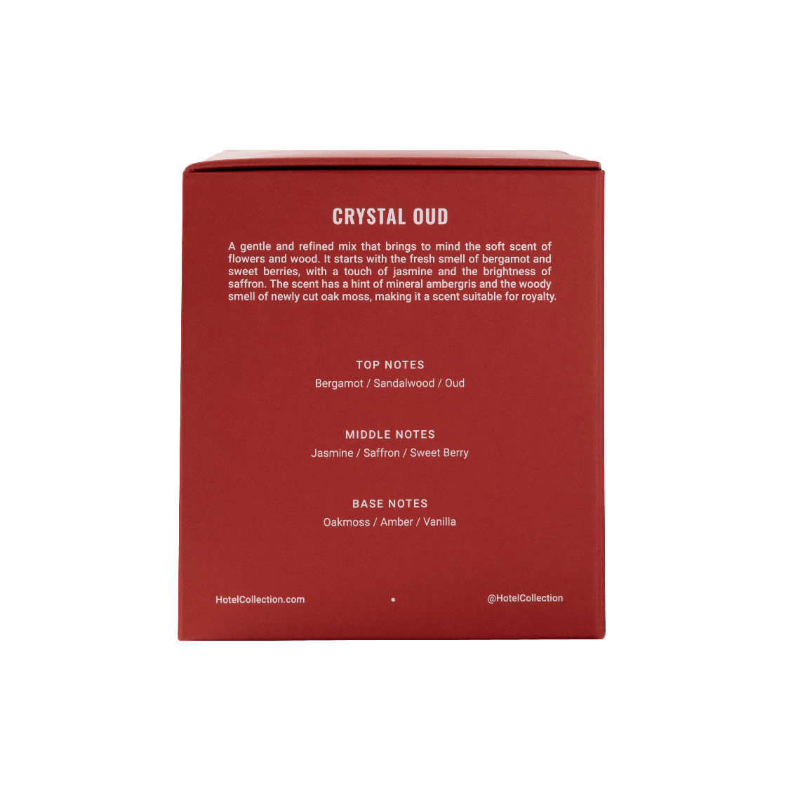 Red packaging with text detailing the fragrance 'Crystal Oud' on a white background