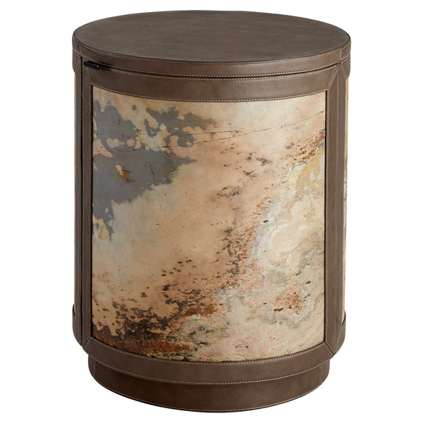 Round side table with textured surface and brown leather accents on a white background