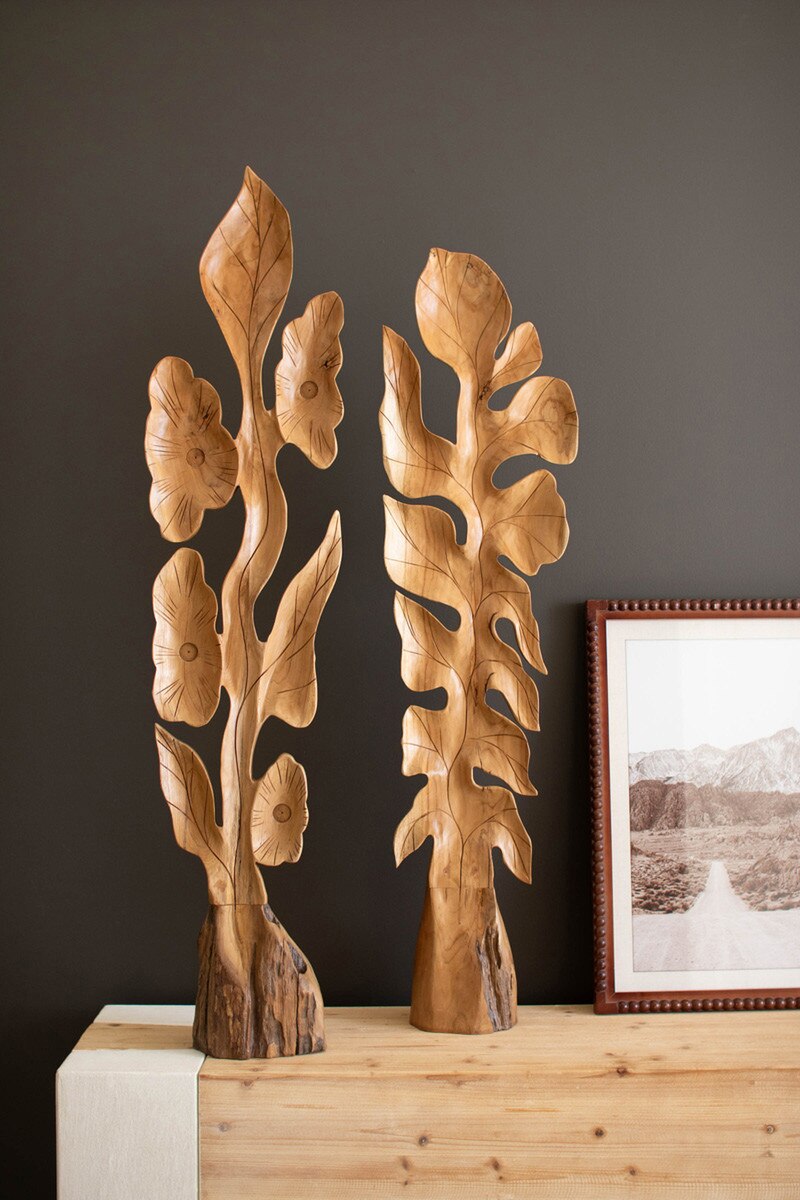 SET OF TWO BOTANICAL TEAK SCULPTURES ABOVE