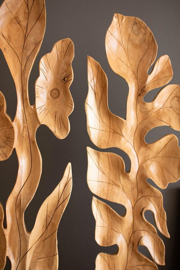 SET OF TWO BOTANICAL TEAK SCULPTURES ABOVE