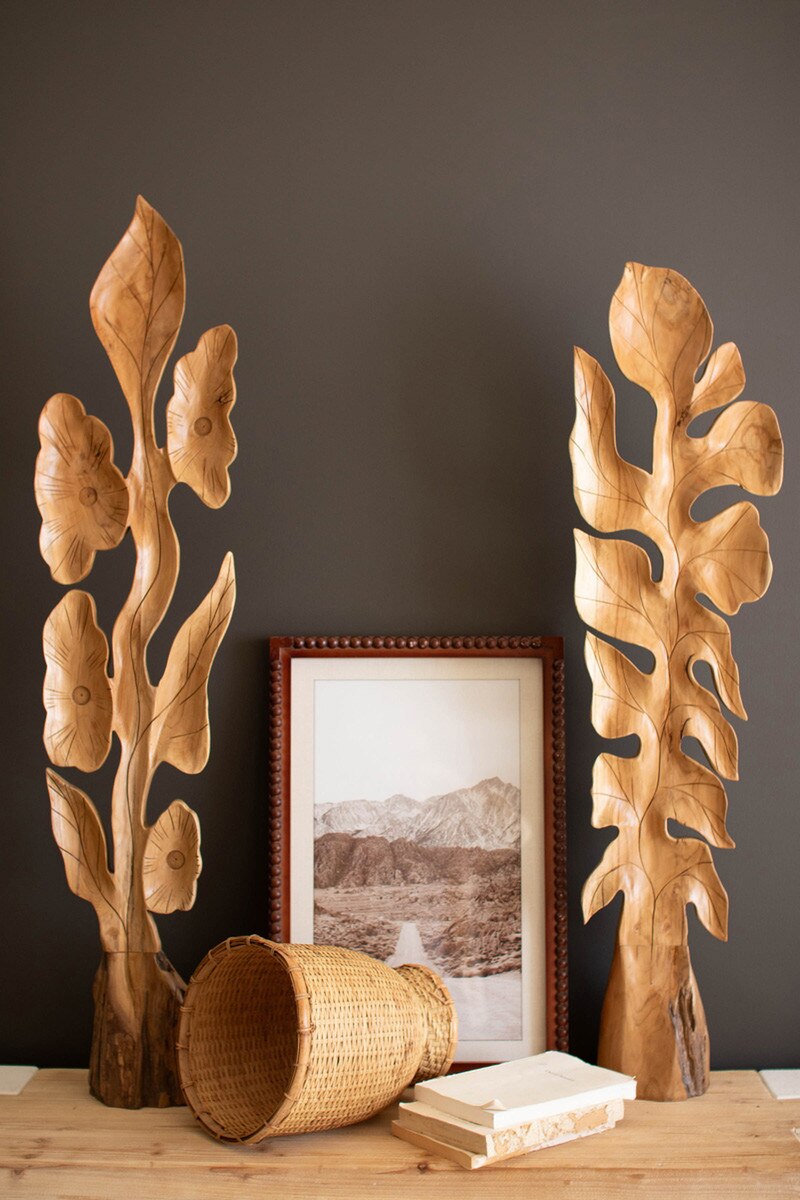 SET OF TWO BOTANICAL TEAK SCULPTURES ABOVE