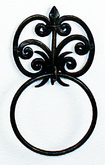 Decorative black metal towel ring with intricate design on a white background