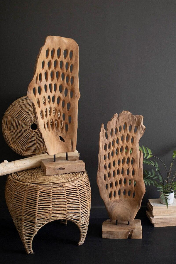 HAND-CARVED TEAK WOOD SCUPLTURE ON A BASE - PERFORATED