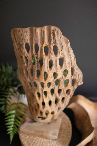 HAND-CARVED TEAK WOOD SCUPLTURE ON A BASE - PERFORATED