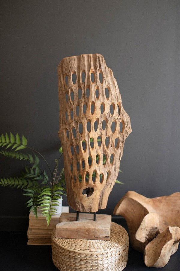 HAND-CARVED TEAK WOOD SCUPLTURE ON A BASE - PERFORATED