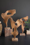 HAND-CARVED TEAK WOOD SCUPLTURE ON A BASE - SMOOTH