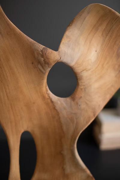 HAND-CARVED TEAK WOOD SCUPLTURE ON A BASE - SMOOTH
