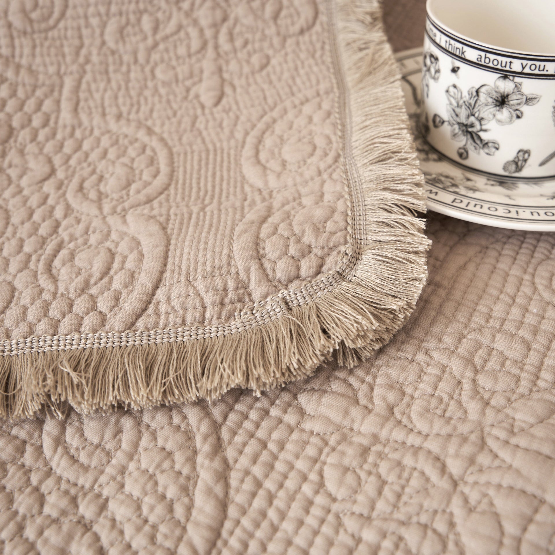 DaDa Bedding Elegant Fringed Cotton Quilted Throw Blanket - Luxurious Solid Soft Paisley Pattern, Cozy Lightweight Lap Throw, Perfect for Couch or Bed, Neutral Sandy Taupe Tan Beige, 50x60 Inches