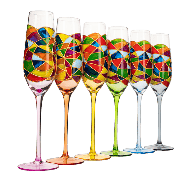 Set of colorful glass flutes with geometric patterns on a white background