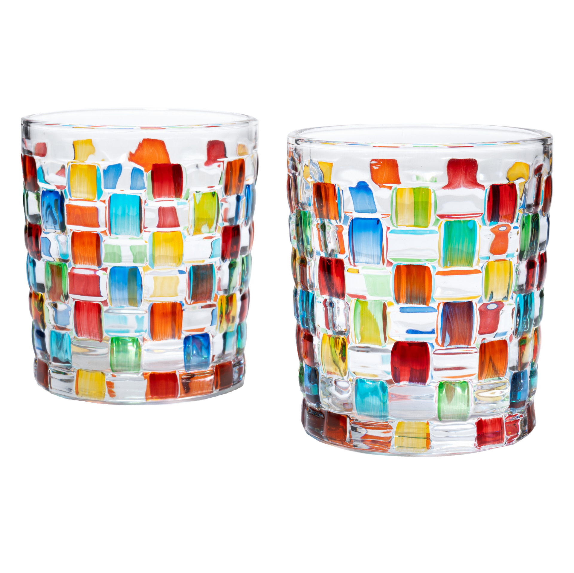 Two colorful glass tumblers with a mosaic pattern on a white background