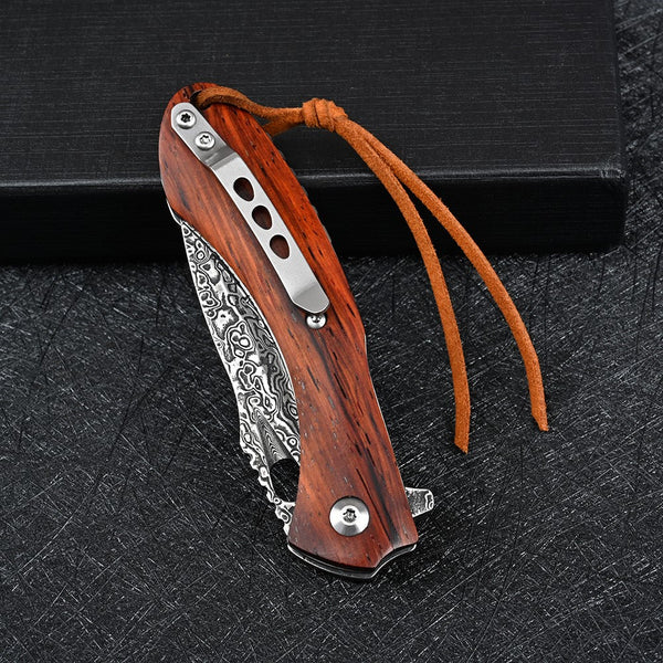 Meteor Engraved Damascus Steel Pocket Knife with Exotic Red Sandal Wood Handle