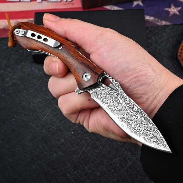 Meteor Engraved Damascus Steel Pocket Knife with Exotic Red Sandal Wood Handle