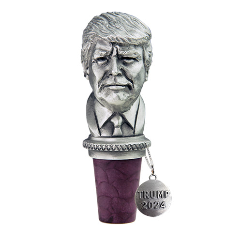 Bottle stopper with a metallic bust of a person and 'TRUMP 2024' tag on a white background