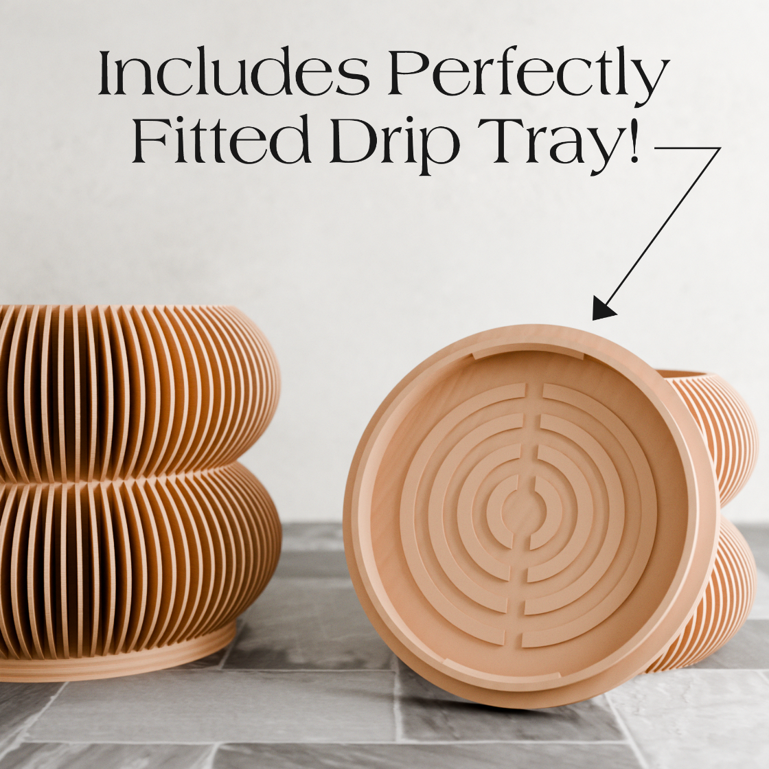 Wooden planter with a perfectly fitted drip tray on a tiled floor.