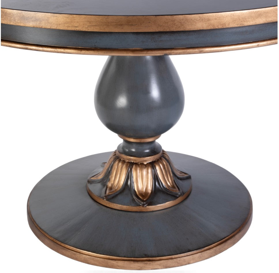 Round table with decorative base on a white background