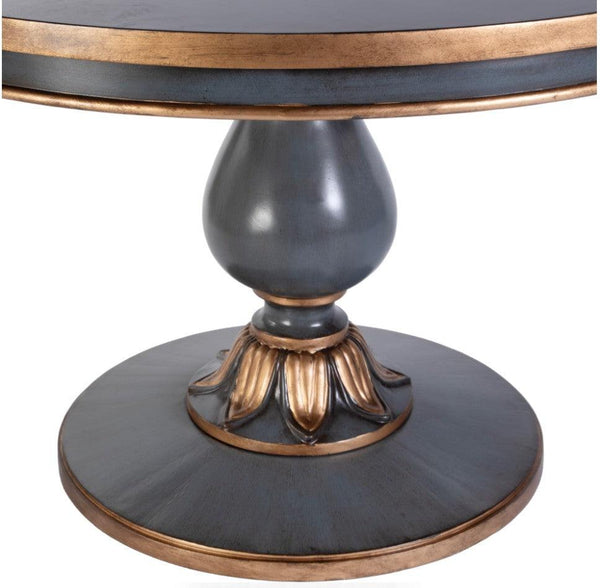 Round table with decorative base on a white background