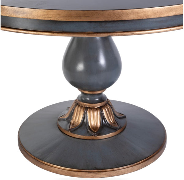 Round table with decorative base on a white background