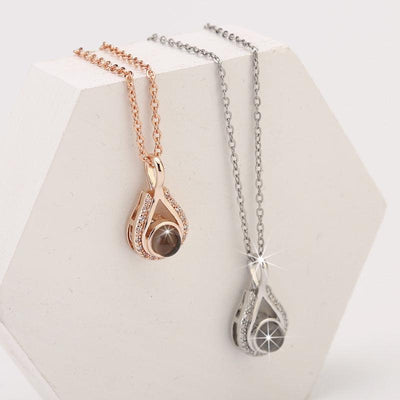 Waterdrop shaped fashion projection necklace with 100 languages. I love you. Color photos, customized lover accessories