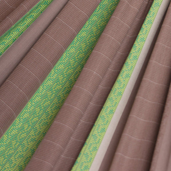Close-up of brown and green fabric swatches