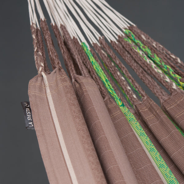 Brown hammock with green accents and 'La Siesta' label on a dark background