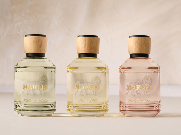 Feminine Deluxe Discovery Eau De Parfam Set by Bob Marley  - Three Marley perfume bottles on a light background