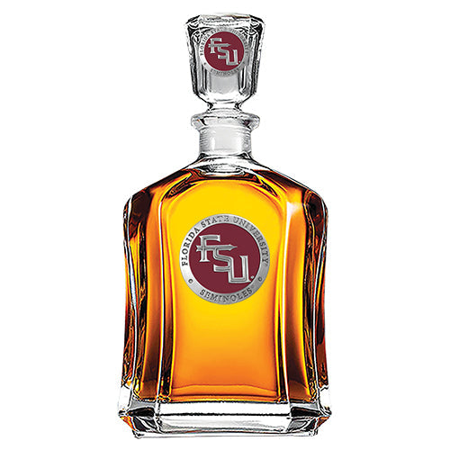 Glass decanter with amber liquid and Florida State University logo on a white background