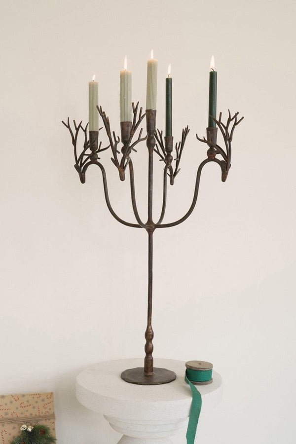 Forged Rustic Iron Deer Candelabra - This tall forged deer candelabra rustic brass suits the hunting camp perfectly. Pair a pair with the wall sconces for a theme.