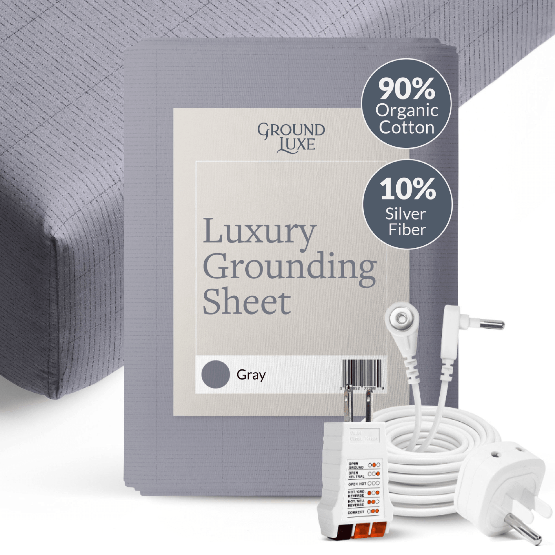 Gray grounding sheet with packaging and accessories on a white background