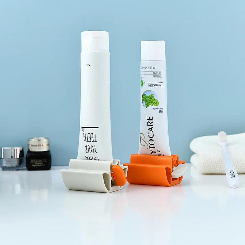 New Bathroom Accessories Toothpaste Squeezer Tooth Paste Dispenser Tube Squeezer Facial Cleanser Press Rolling Holder for Kids