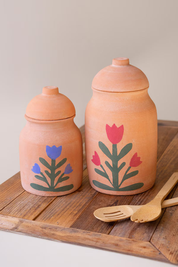 SET OF TWO CLAY CANISTERS WITH PAINTED FLOWER DETAIL