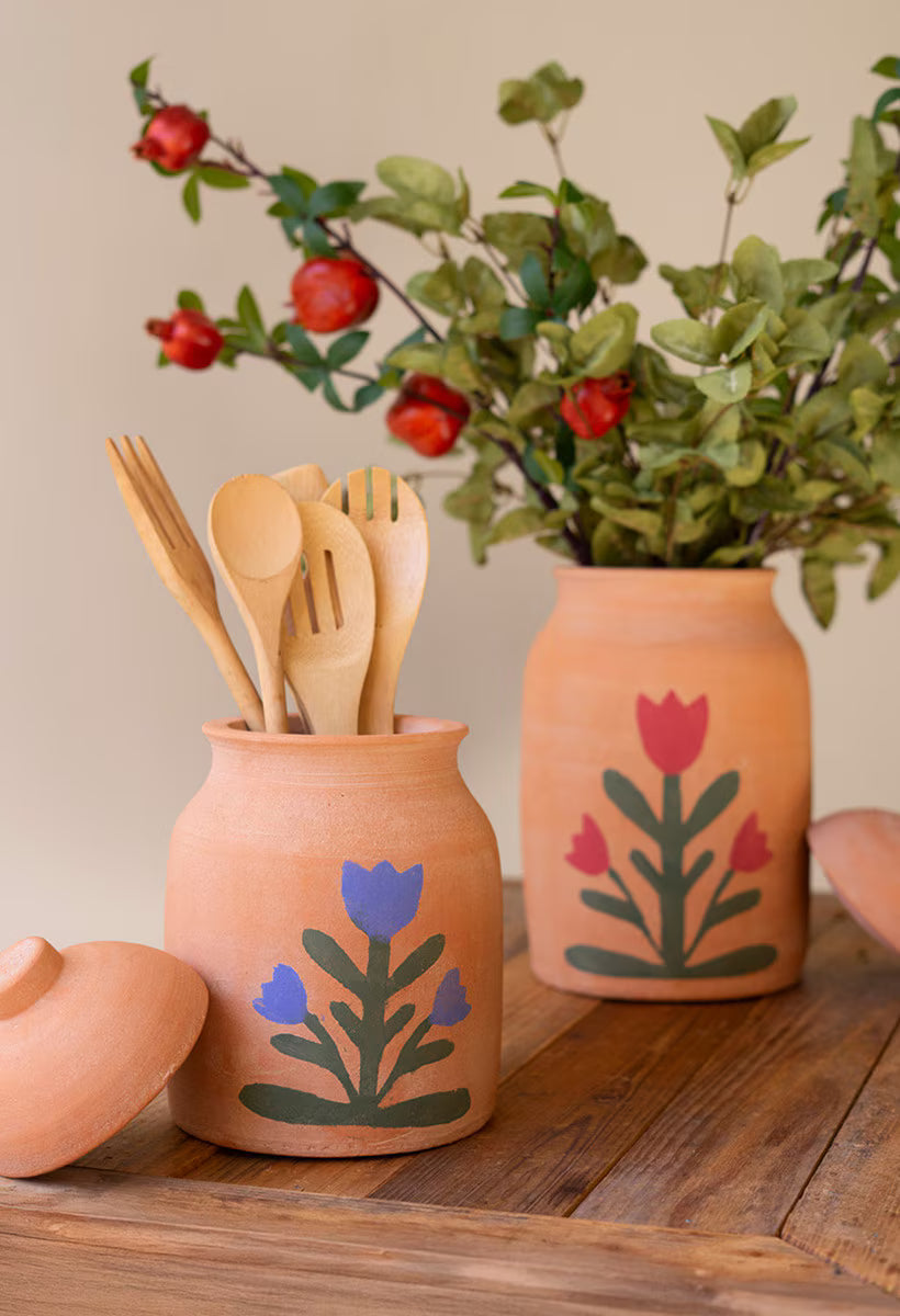 SET OF TWO CLAY CANISTERS WITH PAINTED FLOWER DETAIL