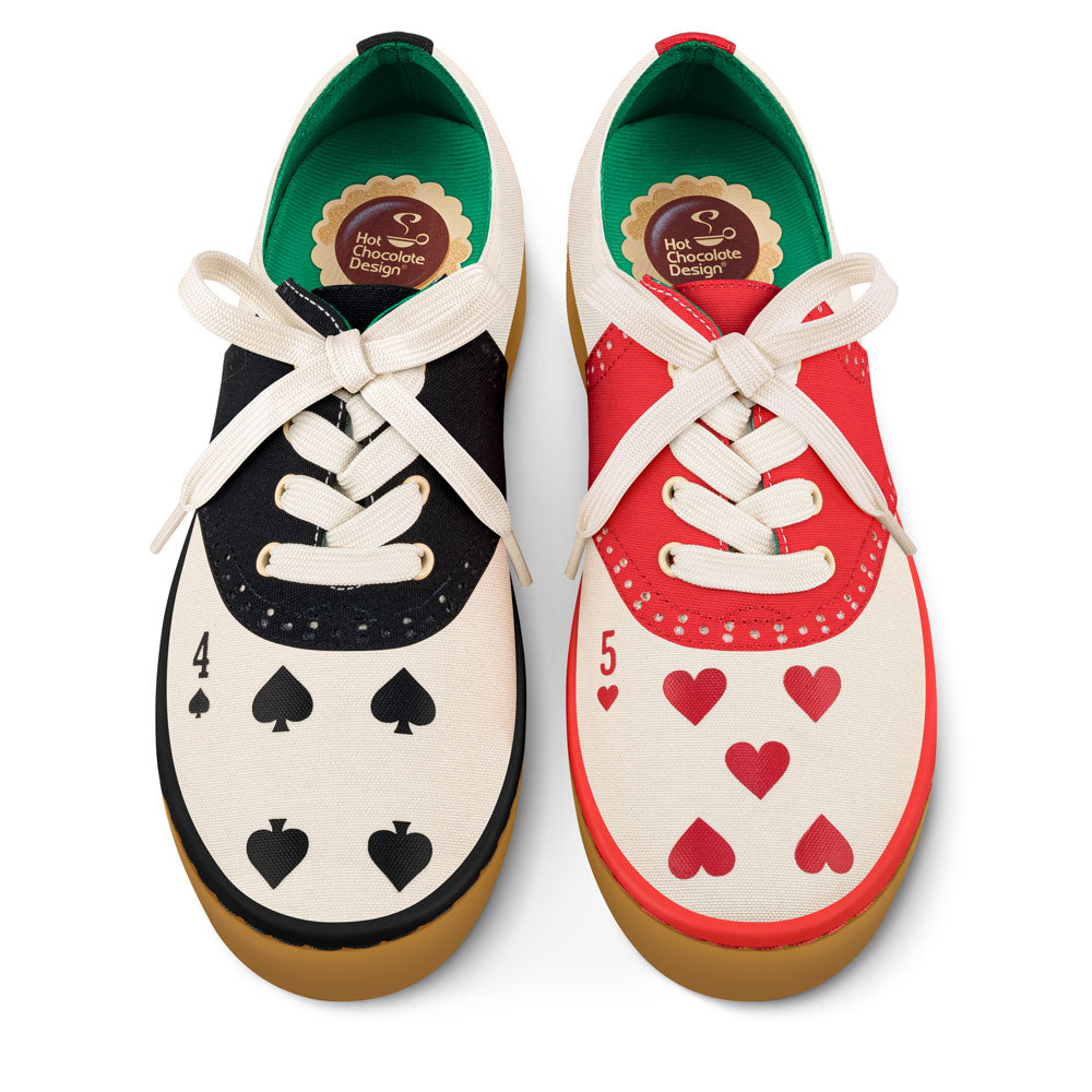 Pair of shoes with playing card design on a white background