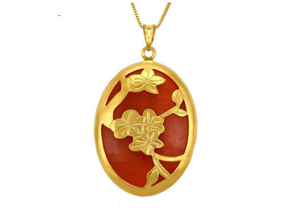 Oval shaped rust-red color noble charms pendant with gold flowers