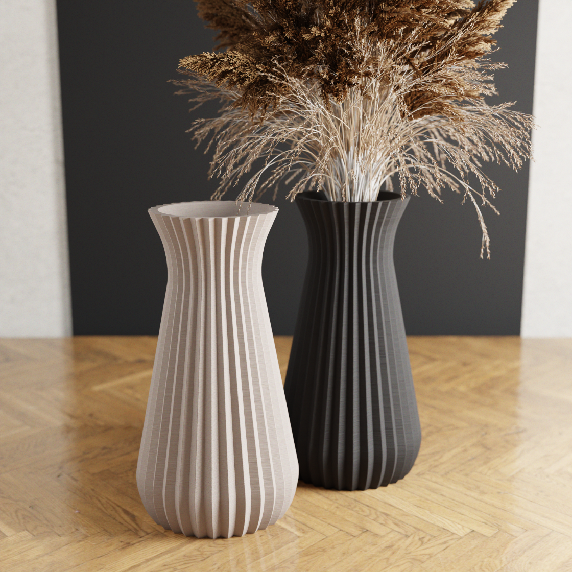 Two decorative vases with striped patterns on a wooden floor.