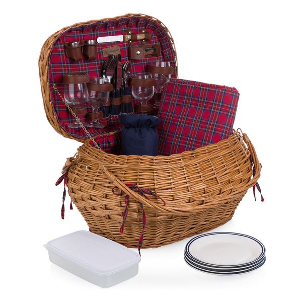 Picnic basket with plaid interior, cutlery, glasses, and plates on a white background