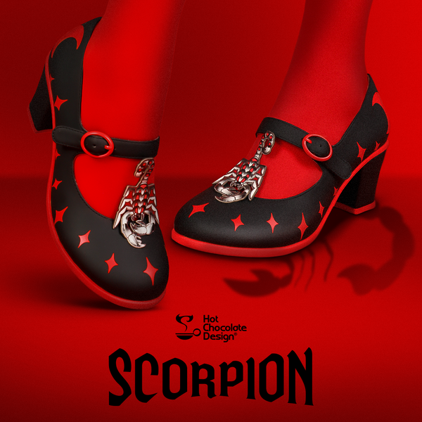 Black and red shoes with scorpion design on a red background, featuring Hot Chocolate Design brand.