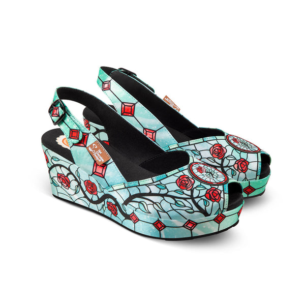 Hot Chocolate Design
Chocolaticas® Stained Roses Women's Sandal Colorful wedge sandals with floral design on a white background 