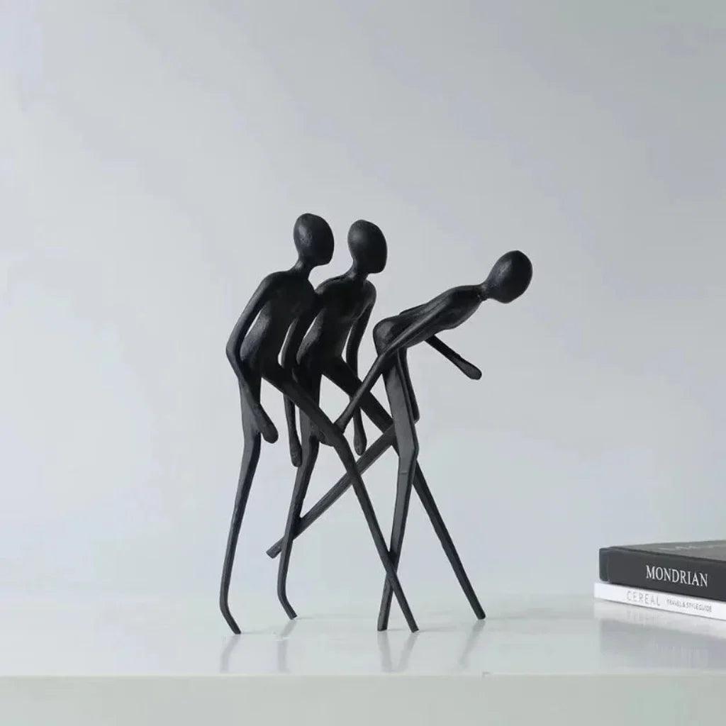 Human Sculpture Matte Black Iron Trio for Your Living Room