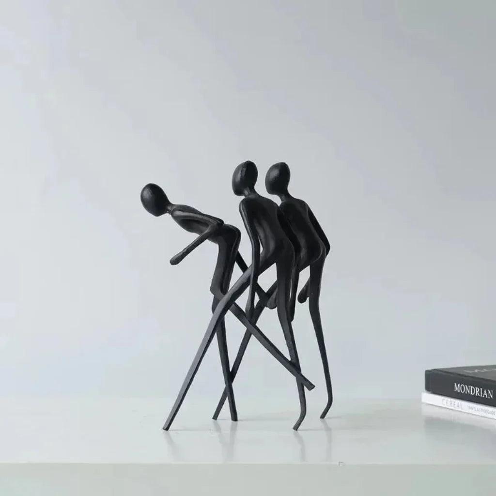 Human Sculpture Matte Black Iron Trio for Your Living Room