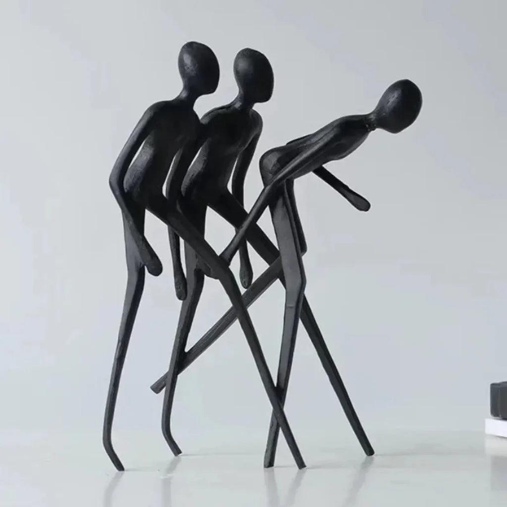 Human Sculpture Matte Black Iron Trio for Your Living Room