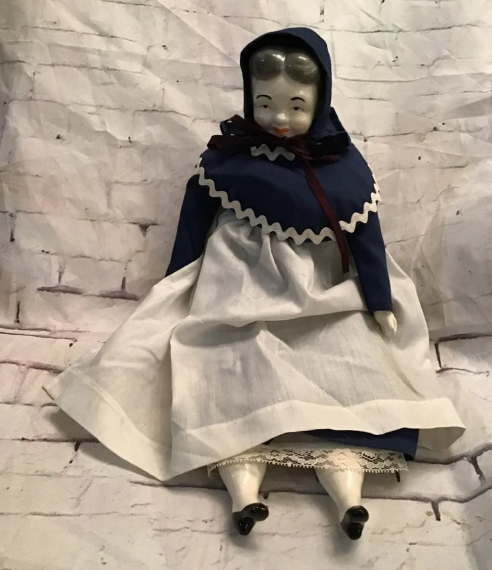 Vintage Porcelain Pilgrim doll. 16