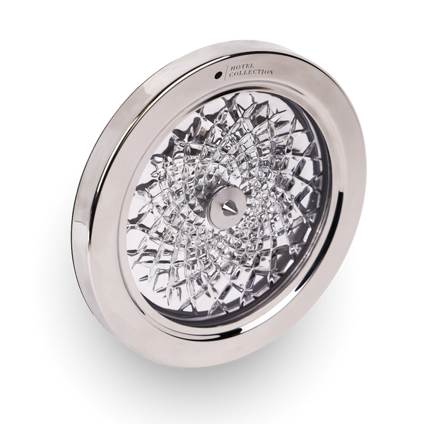 Decorative light fixture with crystal design on a white background