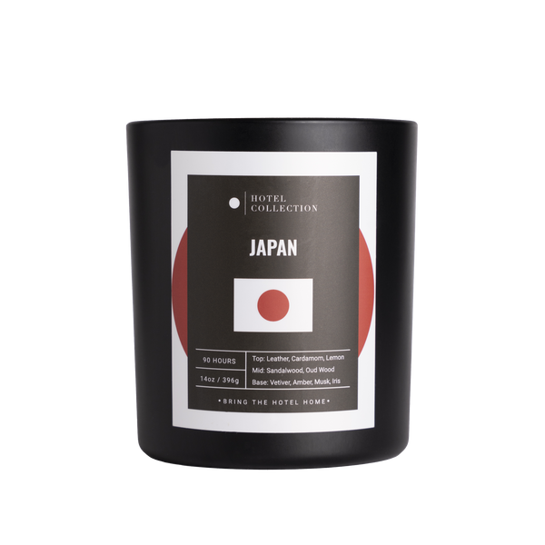 Black candle with 'Japan' label featuring a red circle on a white background