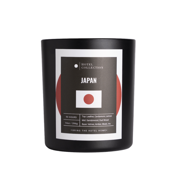Black candle with 'Japan' label featuring a red circle on a white background