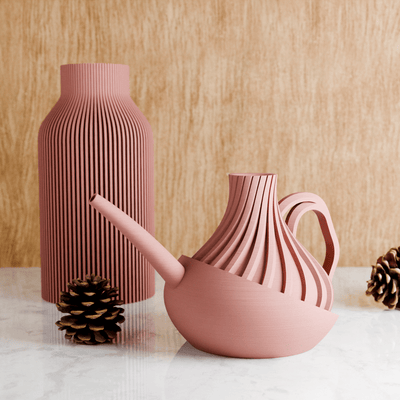 REVOLVE Watering Can