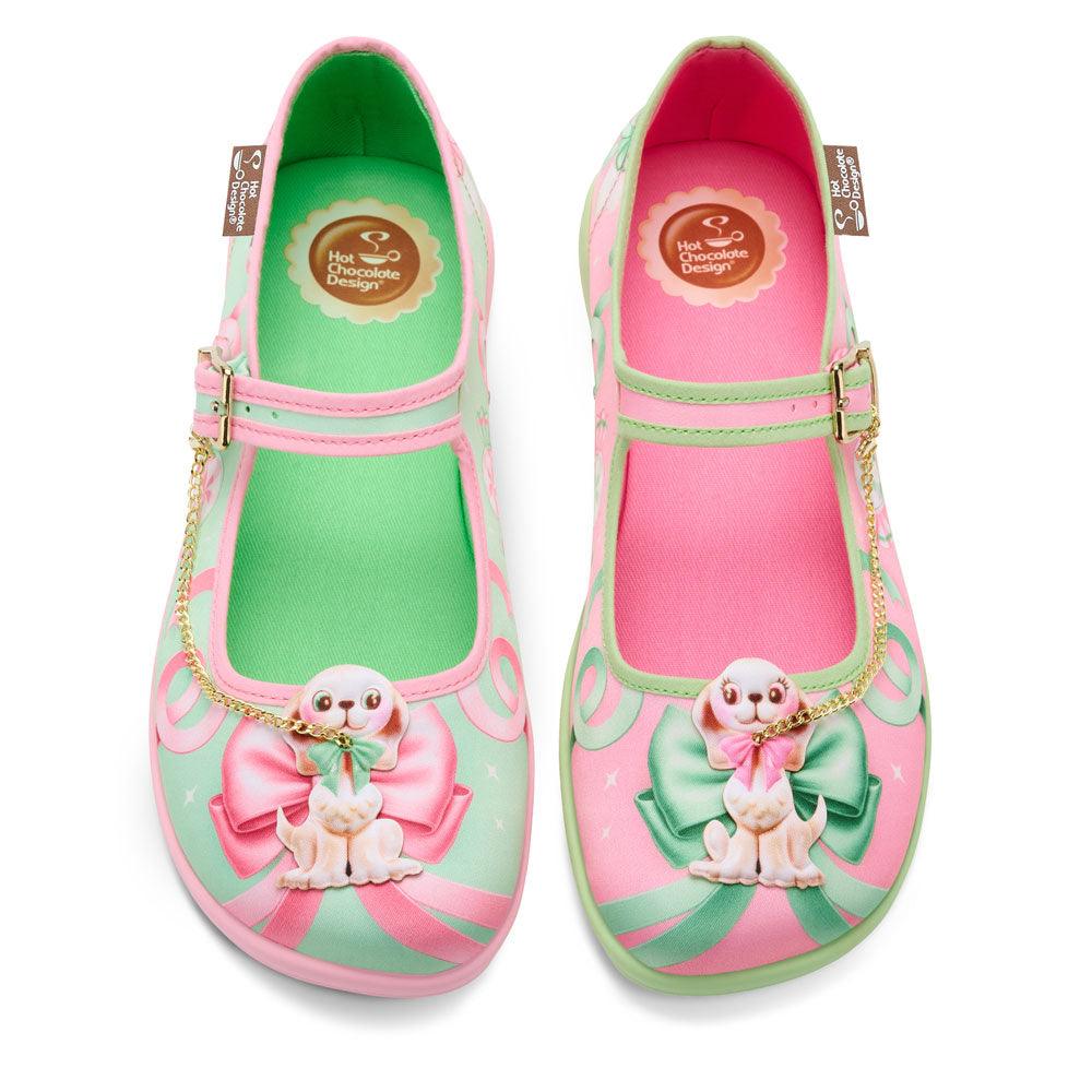 Pair of colorful children's shoes with cartoon character design on a white background