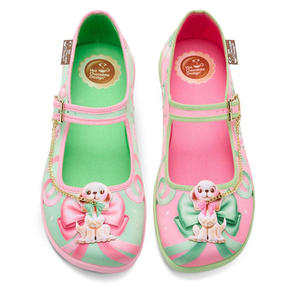 Pair of colorful children's shoes with cartoon character design on a white background